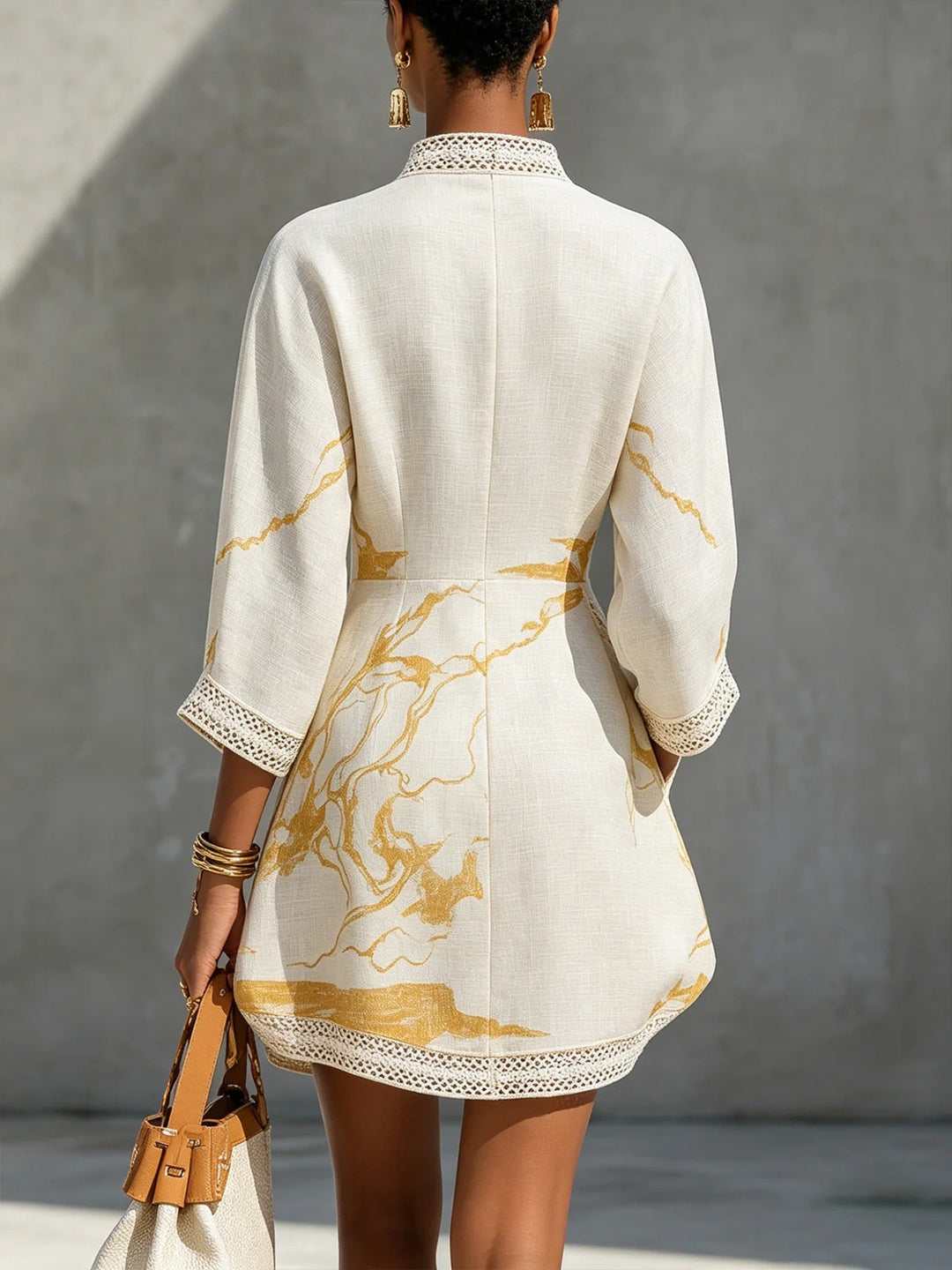 Bianca™ | Mini-robe marbrée dorée